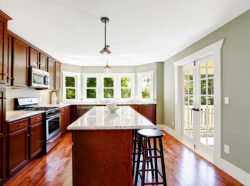 Spacious kitchen room with french door and island